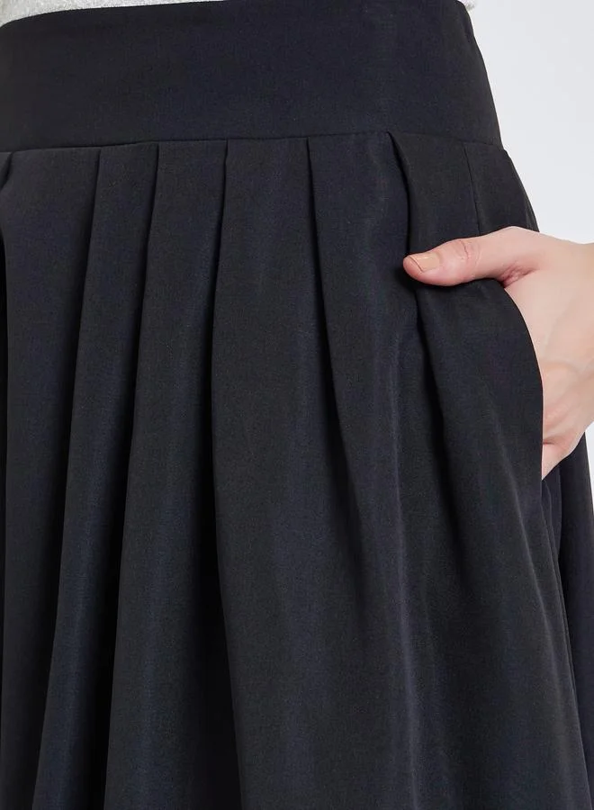 ستايلي تنورة طويلة مكسرة بحافة واسعة